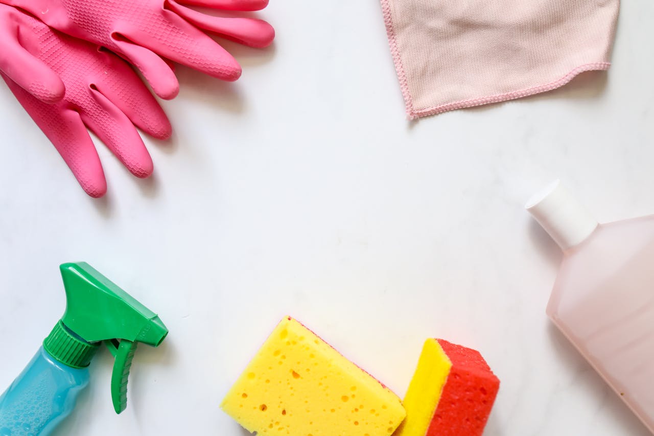 A home cleaning kit on a white surface