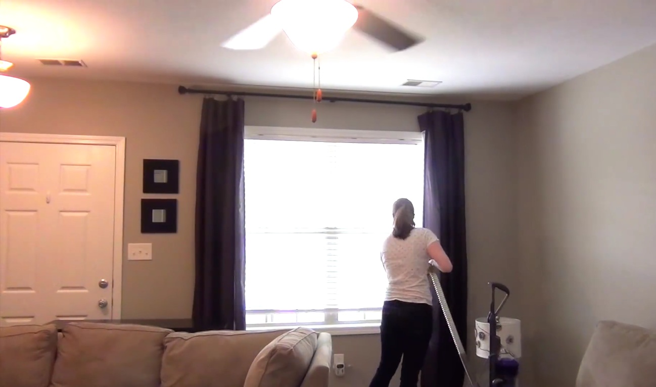 vacuum-cleaning-the-curtains-cricklewood-tenancy-cleaning Thorough move-out cleaning services by Anyclean in NW2