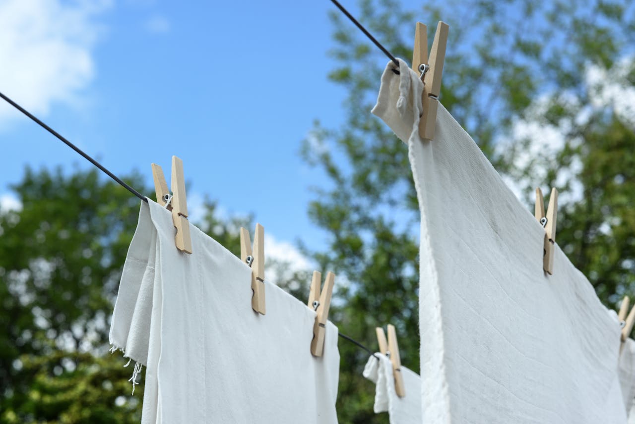 White clothes drying on a drying line