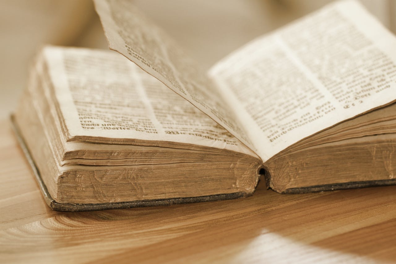 An old leather-bound open book