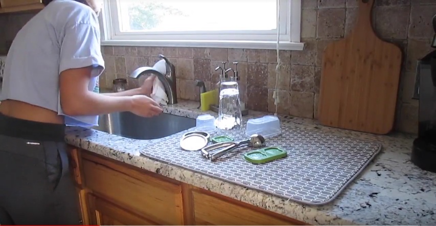 polishing-the-kitchen-sink-and-taps-post-tenancy-treatment-in-luton Comprehensive checkout cleaning help by Anyclean in Luton, Bedfordshire