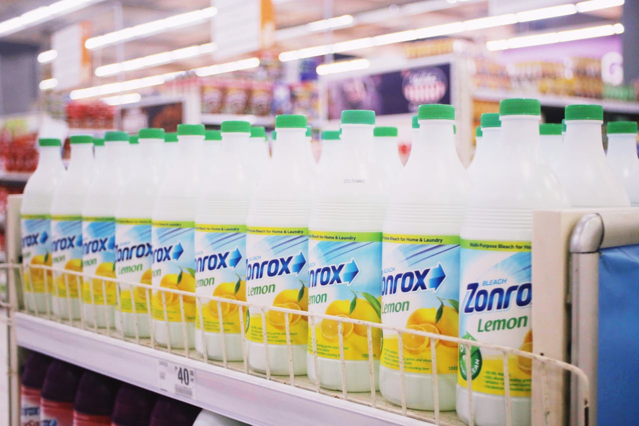 Bottles of chlorine bleach on a supermarket shelf