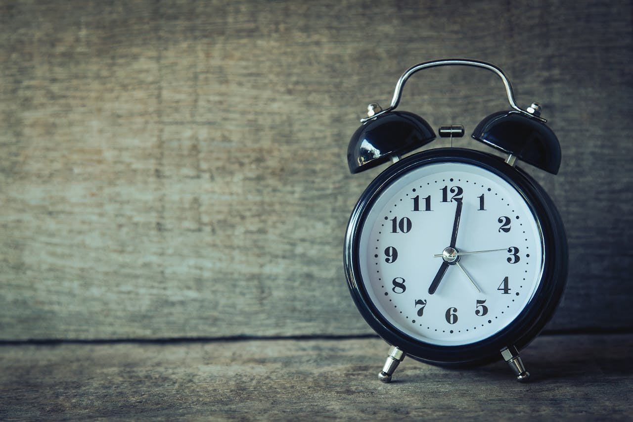 A black and white vintage clock
