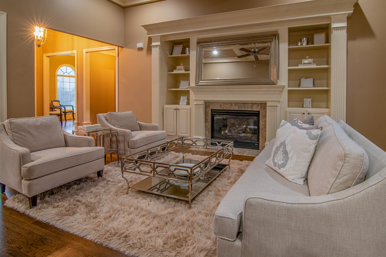 Long pile wool carpet taking centre stage in a large living room.