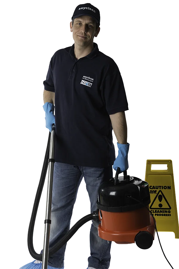 anyclean-commercial-cleaning-operative Anyclean commercial cleaning operative carrying Henry vacuum cleaner